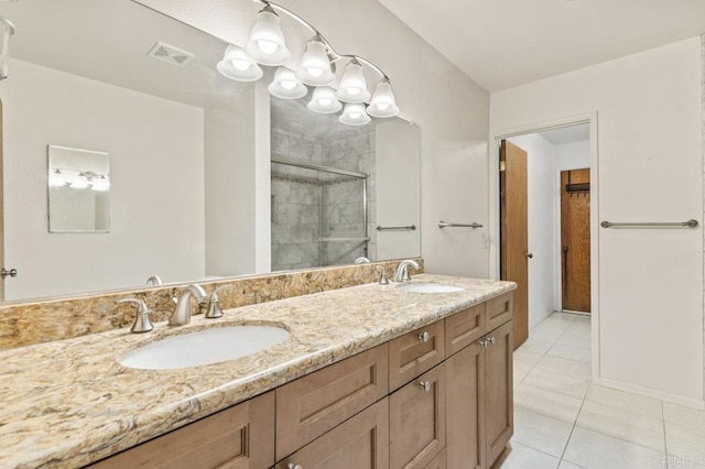 68256827 Kellyn Ln, Vista, CA 92084 - bathroom with visible vents, a sink, tile patterned floors, and a shower stall