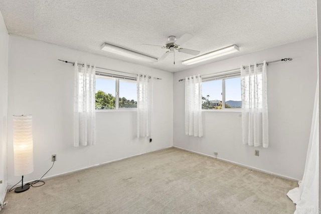 68256827 Kellyn Ln, Vista, CA 92084 - empty room with a ceiling fan, carpet flooring, and a wealth of natural light