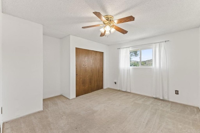 68256827 Kellyn Ln, Vista, CA 92084 - unfurnished bedroom with carpet flooring, a textured ceiling, ceiling fan, and a closet