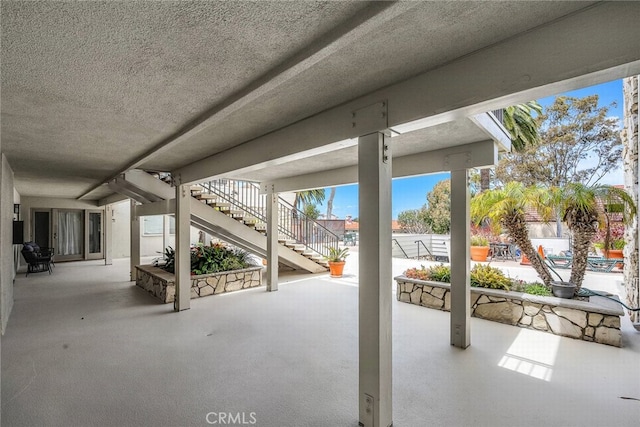 view of patio featuring stairway