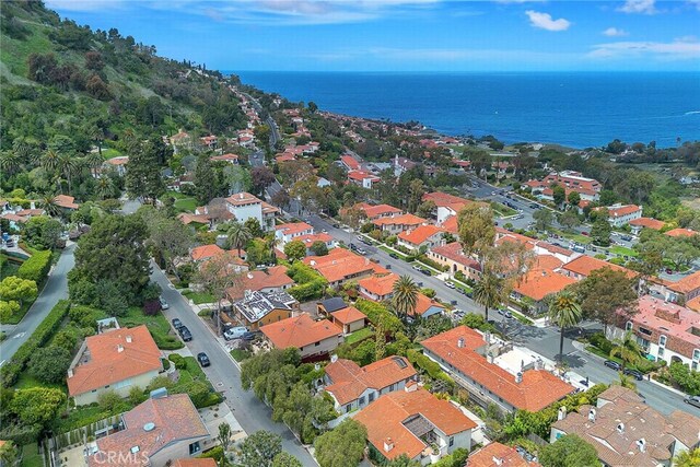 bird's eye view featuring a water view and a residential view