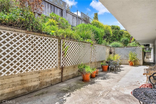 view of patio / terrace with fence