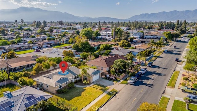 bird's eye view featuring a mountain view and a residential view