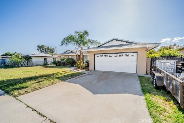 ranch-style house with a garage, fence, a front lawn, concrete driveway, and stucco siding