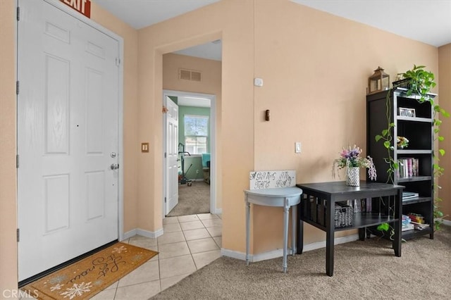 4617 Hidden Glen Dr, Antioch, CA 94531 - foyer featuring light colored carpet, baseboards, visible vents, and light tile patterned floors