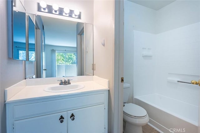 full bathroom featuring vanity, shower / bathing tub combination, and toilet
