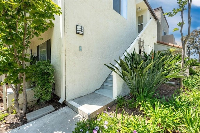 view of home's exterior with stucco siding