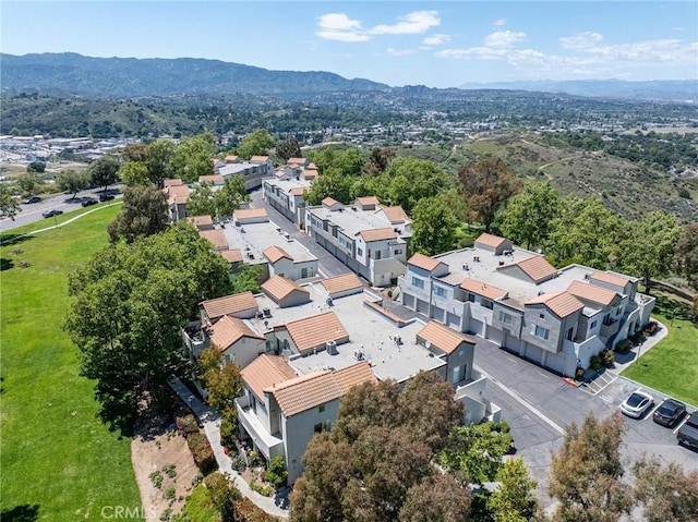 bird's eye view with a residential view and a mountain view
