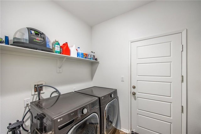 laundry room with laundry area and separate washer and dryer