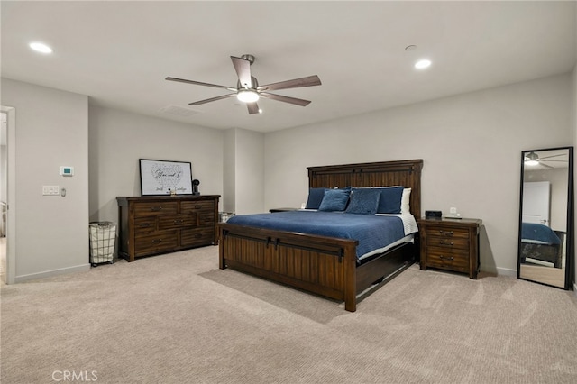 bedroom featuring baseboards, ceiling fan, light carpet, and recessed lighting