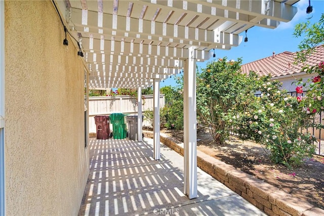 40684 Corte Albara, Murrieta, CA 92562 - view of patio / terrace featuring a pergola and fence