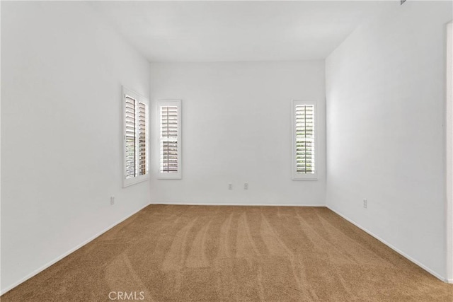40684 Corte Albara, Murrieta, CA 92562 - spare room with baseboards and carpet flooring