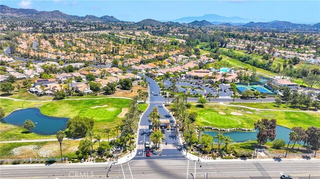 40684 Corte Albara, Murrieta, CA 92562 - drone / aerial view featuring a residential view, golf course view, and a water and mountain view