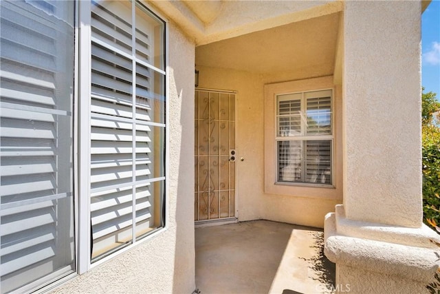 40684 Corte Albara, Murrieta, CA 92562 - property entrance featuring stucco siding