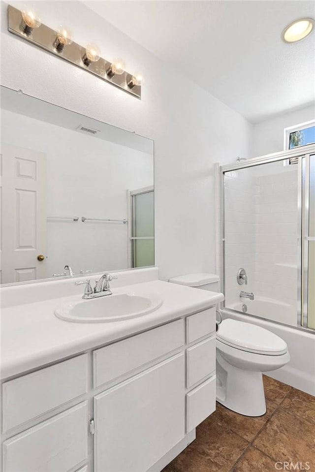 40684 Corte Albara, Murrieta, CA 92562 - full bath featuring enclosed tub / shower combo, toilet, visible vents, and vanity