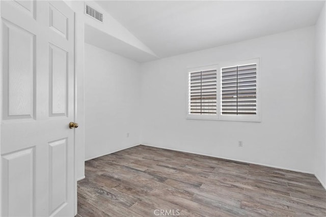 40684 Corte Albara, Murrieta, CA 92562 - empty room featuring wood finished floors, lofted ceiling, and visible vents