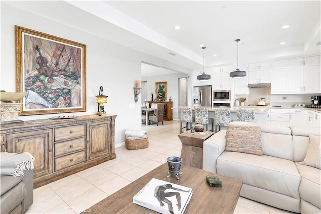 32148 Sedge Way, Temecula, CA 92591 - living area featuring light tile patterned floors, recessed lighting, and a raised ceiling