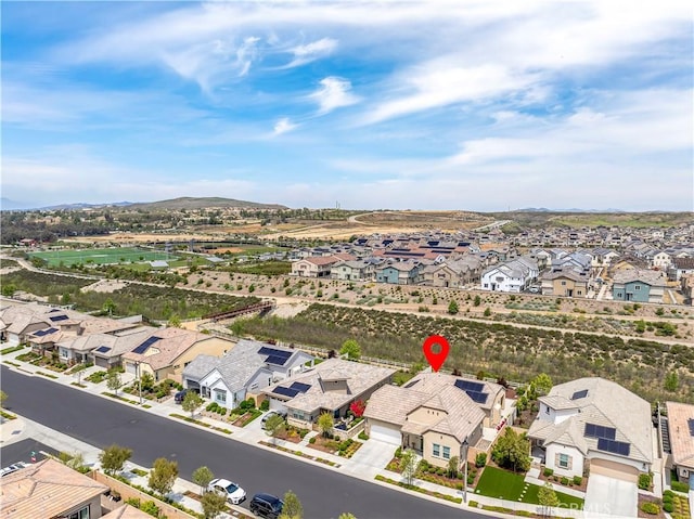 drone / aerial view with a mountain view and a residential view