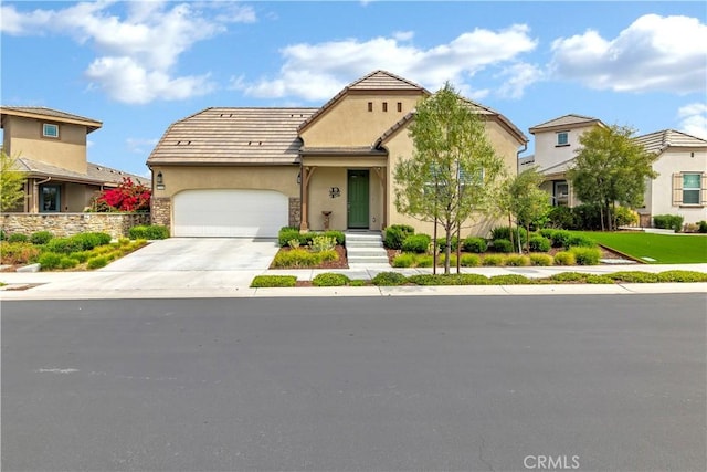 32148 Sedge Way, Temecula, CA 92591 - view of front of house with a garage, driveway, stucco siding, and stone siding