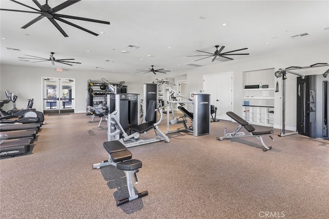 gym featuring recessed lighting, visible vents, and french doors