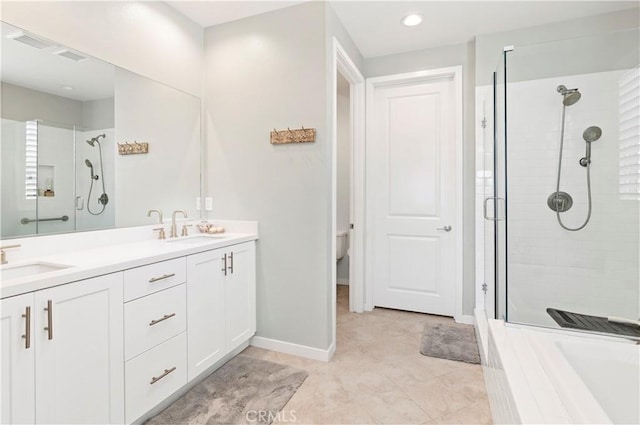 32148 Sedge Way, Temecula, CA 92591 - bathroom with a shower stall, double vanity, baseboards, toilet, and tile patterned flooring
