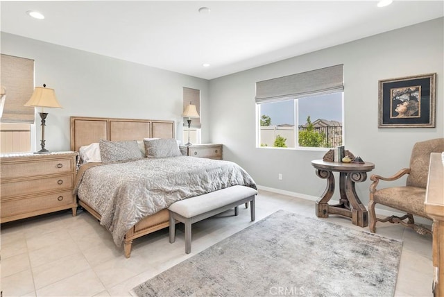 bedroom with recessed lighting and baseboards