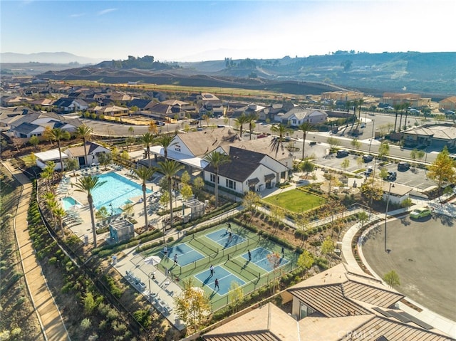 32148 Sedge Way, Temecula, CA 92591 - aerial perspective of suburban area with a pool and a mountainous background