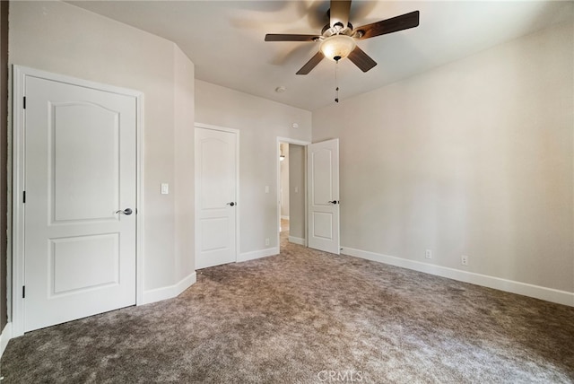 14124 Rollins Ct, Magalia, CA 95954 - unfurnished bedroom featuring baseboards, ceiling fan, and carpet