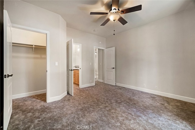 14124 Rollins Ct, Magalia, CA 95954 - unfurnished bedroom featuring ceiling fan, carpet, baseboards, a spacious closet, and a closet