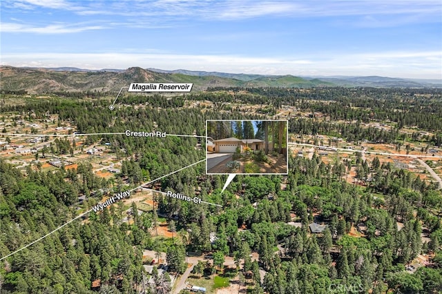 14124 Rollins Ct, Magalia, CA 95954 - drone / aerial view with a view of trees and a mountain view