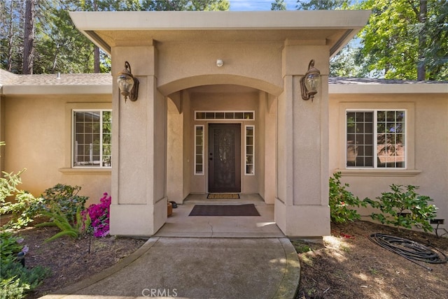 14124 Rollins Ct, Magalia, CA 95954 - property entrance featuring stucco siding