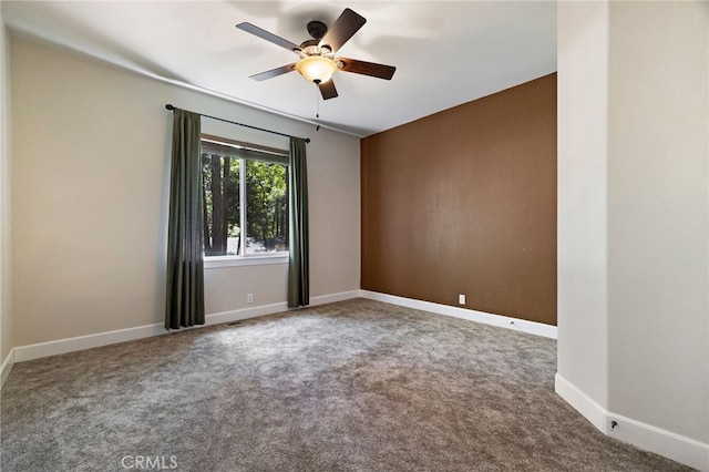14124 Rollins Ct, Magalia, CA 95954 - carpeted spare room featuring baseboards and ceiling fan