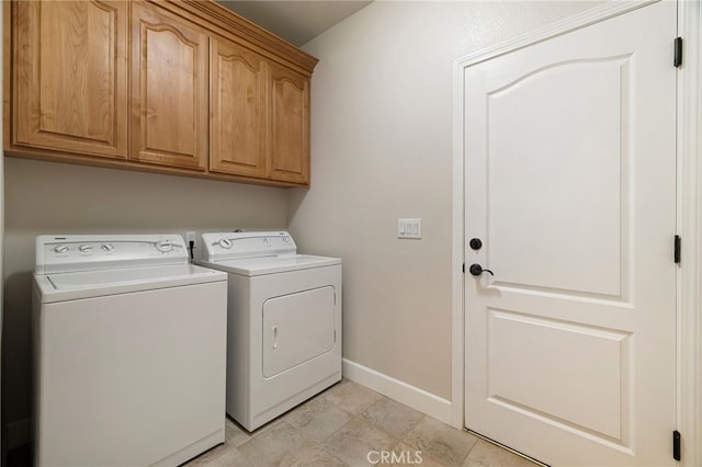 14124 Rollins Ct, Magalia, CA 95954 - laundry room with baseboards, independent washer and dryer, and cabinet space