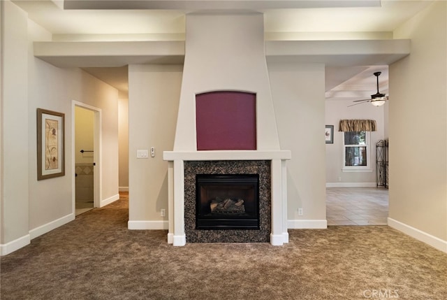 14124 Rollins Ct, Magalia, CA 95954 - unfurnished living room featuring carpet flooring, a ceiling fan, baseboards, and a glass covered fireplace