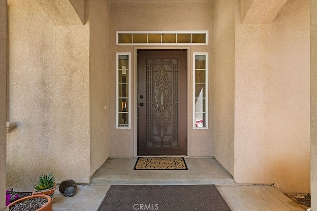 14124 Rollins Ct, Magalia, CA 95954 - view of exterior entry with stucco siding