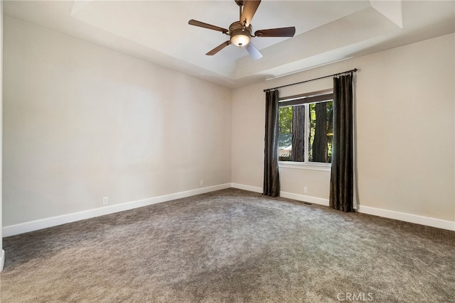 14124 Rollins Ct, Magalia, CA 95954 - carpeted empty room featuring baseboards, ceiling fan, and a tray ceiling