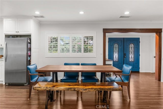 31869 Florida St, Redlands, CA 93373 - dining room with visible vents, wood finished floors, and ornamental molding