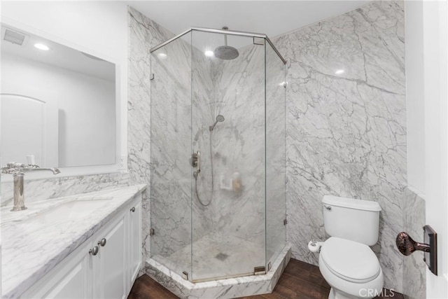 31869 Florida St, Redlands, CA 93373 - full bathroom with a marble finish shower, tile walls, vanity, and visible vents