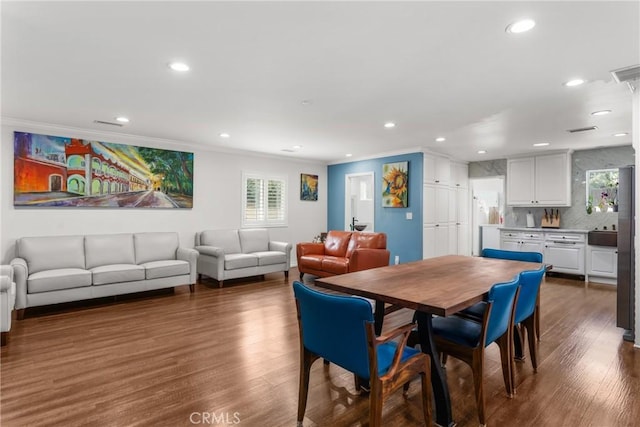 31869 Florida St, Redlands, CA 93373 - dining space with ornamental molding, a wealth of natural light, wood finished floors, and recessed lighting