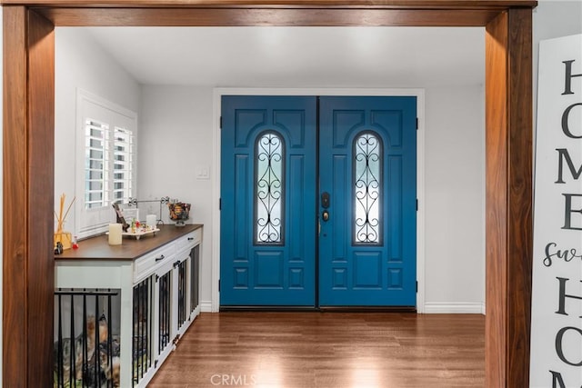 31869 Florida St, Redlands, CA 93373 - foyer entrance with dark wood-style flooring and baseboards