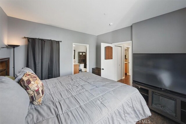 13836 Balboa Blvd Unit 164, Sylmar, CA 91342 - bedroom with dark wood finished floors and ensuite bathroom