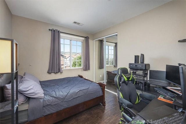 13836 Balboa Blvd Unit 164, Sylmar, CA 91342 - bedroom featuring baseboards, visible vents, wood finished floors, and a closet