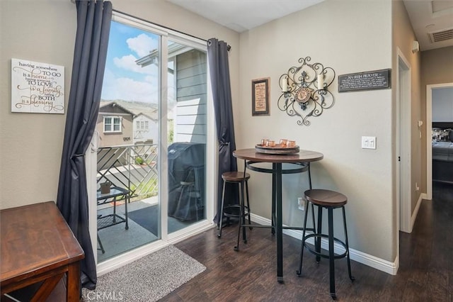 13836 Balboa Blvd Unit 164, Sylmar, CA 91342 - doorway to outside featuring visible vents, baseboards, and wood finished floors