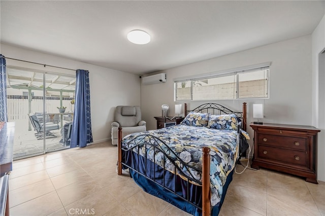 bedroom featuring access to outside, a wall unit AC, light tile patterned floors, and multiple windows