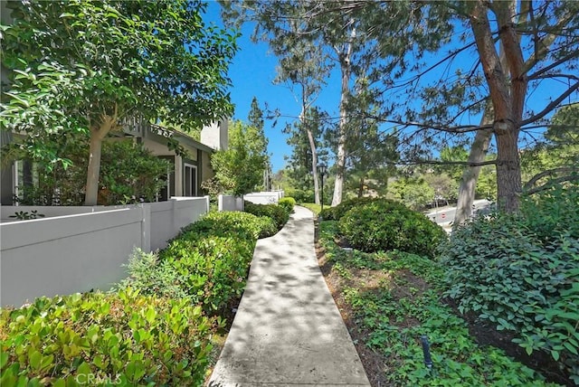 view of property's community with fence