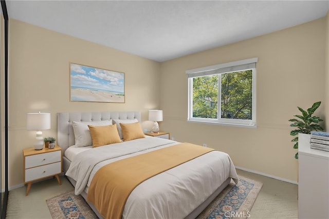 bedroom featuring baseboards and carpet floors