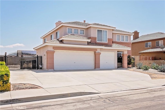 traditional-style home with stucco siding, fence, driveway, and a garage