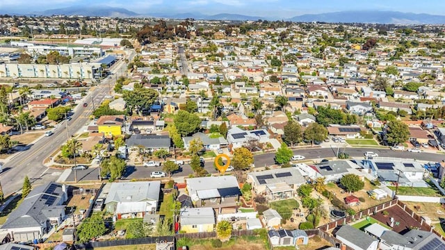aerial view with a mountain view and a residential view