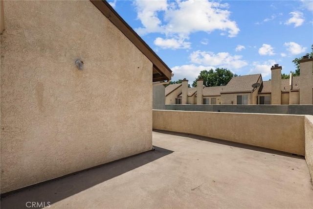 view of patio / terrace with a balcony