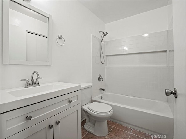 full bath featuring toilet,  shower combination, tile patterned floors, and vanity